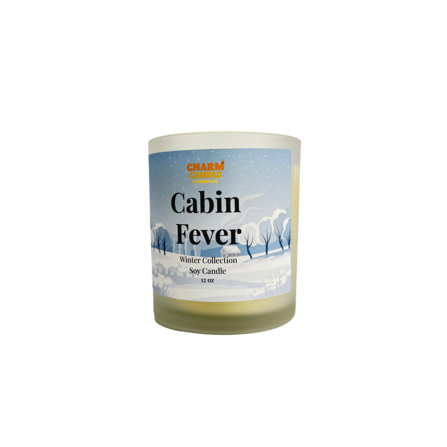 Soy candle labeled 'Cabin Fever' from the Winter Collection on a white background