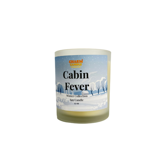 Soy candle labeled 'Cabin Fever' from the Winter Collection on a white background