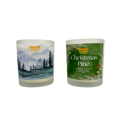 Two Christmas Pine candles with labels on a white background