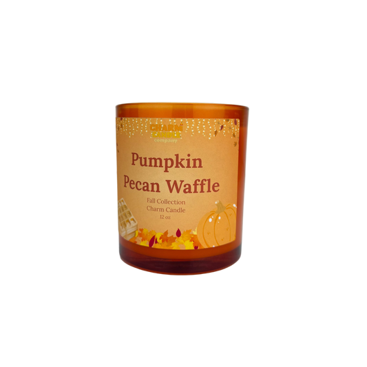 Candle with 'Pumpkin Pecan Waffle' label on a white background