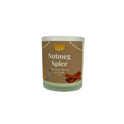 Candle with 'Nutmeg Spice' label on a white background